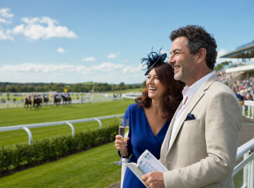 Couple dining during a Thames river cruise anniversary gift experience for parents